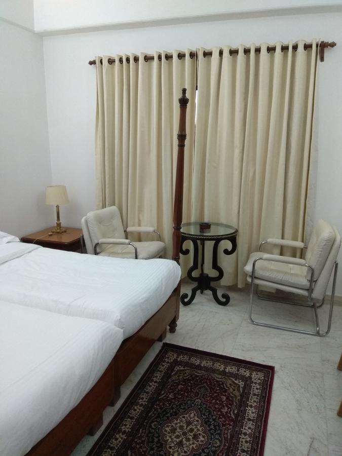 Hotel Palm Greens New Delhi Extérieur photo