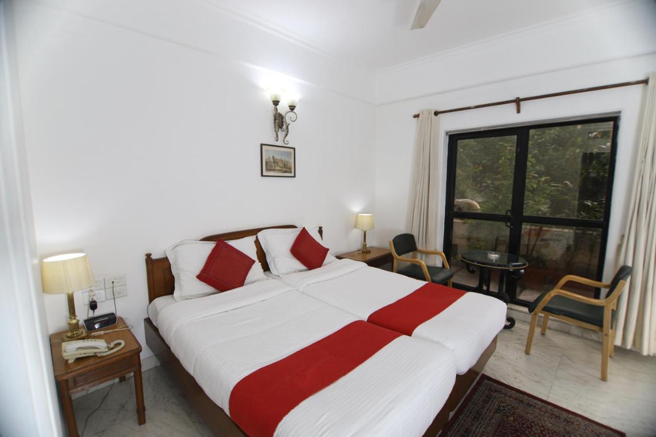 Hotel Palm Greens New Delhi Extérieur photo