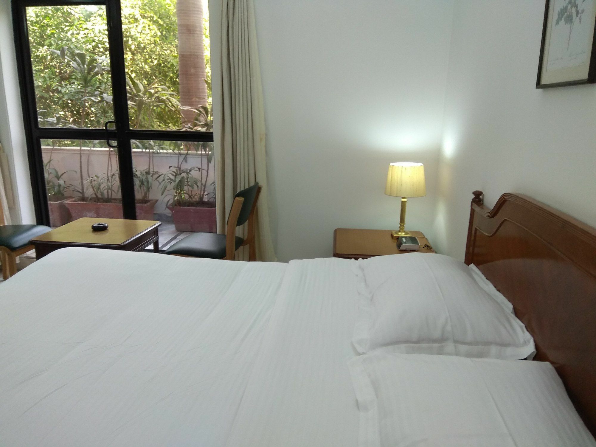 Hotel Palm Greens New Delhi Extérieur photo